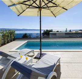 5 bedroom beachfront villa with heated pool near Omis, sleeps 9